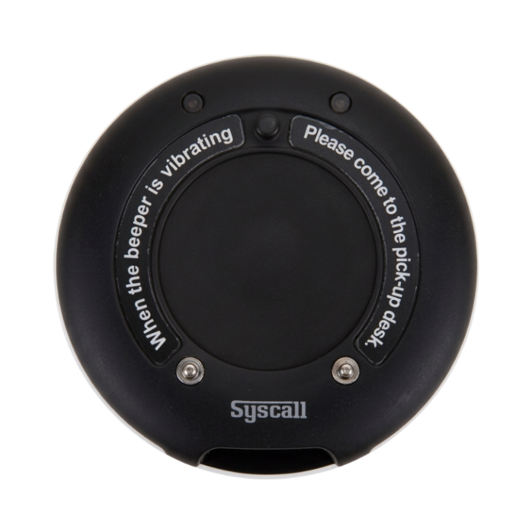 Stacked Syscall coaster pagers for restaurant guest paging system.